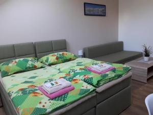 Postel nebo postele na pokoji v ubytování Penzion Na Hrazi
