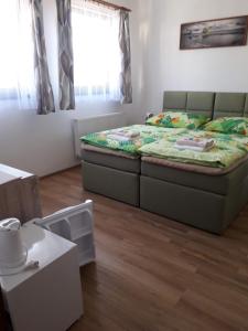 Postel nebo postele na pokoji v ubytování Penzion Na Hrazi