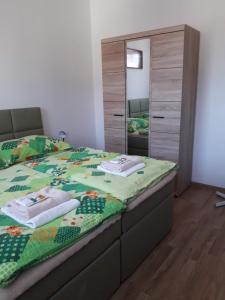 Postel nebo postele na pokoji v ubytování Penzion Na Hrazi