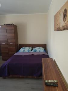 Postel nebo postele na pokoji v ubytování Zacisze 6