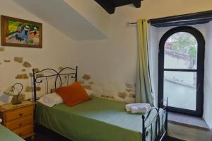 Postel nebo postele na pokoji v ubytování Casaspa7