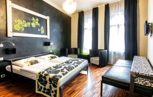 Postel nebo postele na pokoji v ubytování Czech Inn