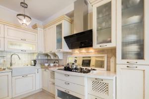 Kuchyňa alebo kuchynka v ubytovaní Luxury apartment Loreta