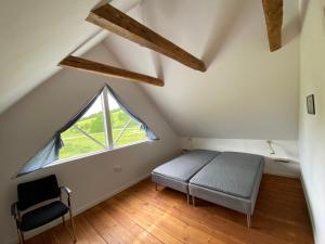 Letto o letti in una camera di Stenhuset i Pilbrodalen