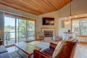 a living room with a couch and a table at Gateway to Mt Bachelor in Bend