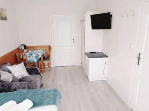 TV a/nebo společenská místnost v ubytování Solar Bed & Breakfast