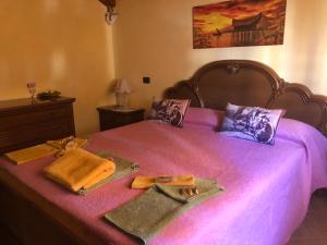 A bed or beds in a room at B&B Fior di Loto