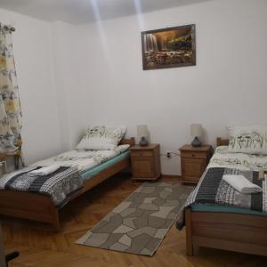Ліжко або ліжка в номері Apartament Na Rozdrożu