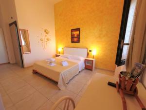 Postel nebo postele na pokoji v ubytování Hotel Alba Chiara Sant'Andrea Salento