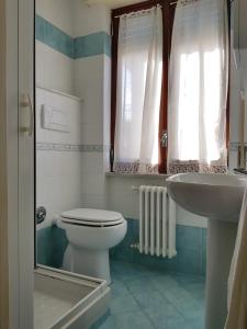 a bathroom with a toilet and a sink at Villa Susy Relais in Sant'Agnello +57 photos