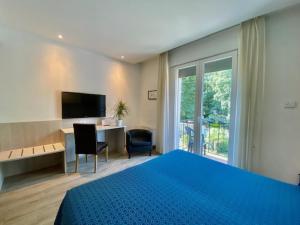 TV a/nebo společenská místnost v ubytování Hotel Garibaldi
