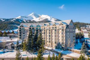 an aerial view of a hotel with a mountain in the background at Shoshone 1972 in Big Sky Mountain Village