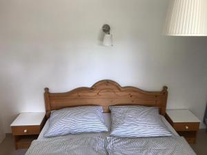 Postel nebo postele na pokoji v ubytování Retro ház