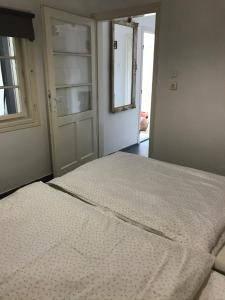 Postel nebo postele na pokoji v ubytování Retro ház