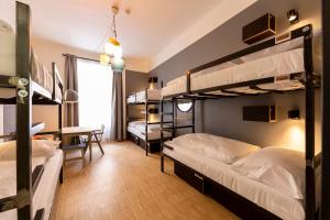 Postel nebo postele na pokoji v ubytování Czech Inn