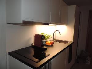 Kuchyňa alebo kuchynka v ubytovaní Apartament 514 Seaside z widokiem na morze + 3 fotografie