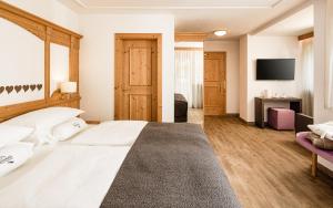 Postel nebo postele na pokoji v ubytování Giardin Boutique Hotel B&B