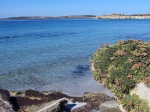 a view of the ocean from the shore at Casa Liliana in Oristano