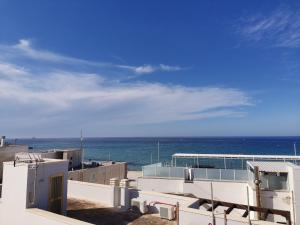 a view of the ocean from a building at Appartamento SeaLife in San Foca