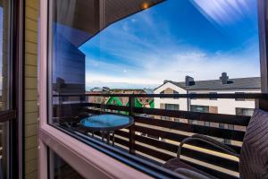 a view from a window of a balcony at Palangos Vila in Palanga