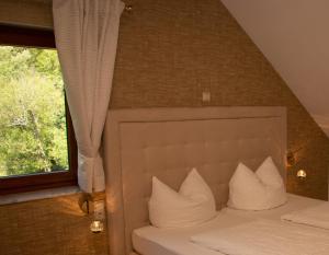 Posteľ alebo postele v izbe v ubytovaní Hotel-Restaurant Laux