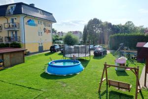 Bazén v ubytovaní VILLA DORA - CENTRUM, BASEN 5m x 10m, Plac zabaw, Parking alebo v jeho blízkosti
