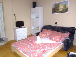 מיטה או מיטות בחדר ב-Balatoni Nyár Vendégház