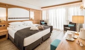 Postel nebo postele na pokoji v ubytování Giardin Boutique Hotel B&B