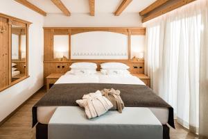 Postel nebo postele na pokoji v ubytování Giardin Boutique Hotel B&B