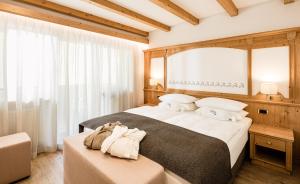 Postel nebo postele na pokoji v ubytování Giardin Boutique Hotel B&B