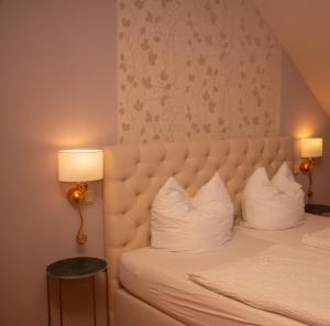 Postel nebo postele na pokoji v ubytování Hotel-Restaurant Laux