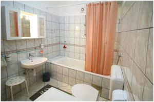 Koupelna v ubytování Studio Apartman Elena + 13 fotografií