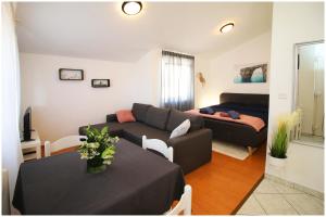 Postel nebo postele na pokoji v ubytování Studio Apartman Elena