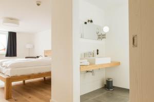 Ein Bett oder Betten in einem Zimmer der Unterkunft Hof Hallenberg