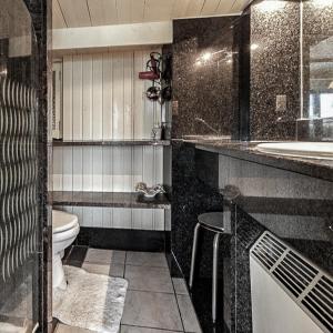 Kylpyhuone majoituspaikassa Chalet Den Keibilk