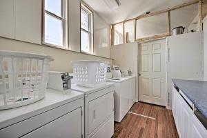 a kitchen with white appliances and a white door at 3 Mi to Lake Michigan Pet-Friendly Apt in Sawyer in Sawyer +17 photos