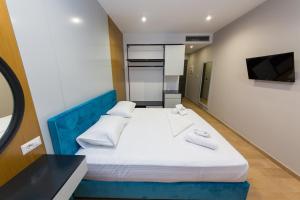 Postel nebo postele na pokoji v ubytování Delight Hotel