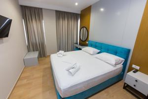 Postel nebo postele na pokoji v ubytování Delight Hotel