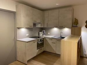 Kuchyň nebo kuchyňský kout v ubytování Apartment Bel-Air