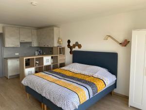 Kuchyň nebo kuchyňský kout v ubytování Apartment Bel-Air
