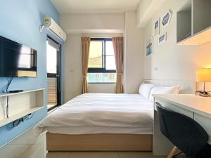 Cama o camas de una habitación en Adagio Hostel