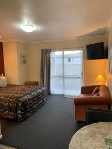Postel nebo postele na pokoji v ubytování Aldan Lodge