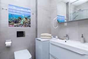 Kúpeľňa v ubytovaní Kasprowicza 20 Uzdrowisko by Jantar Apartamenty Kołobrzeg