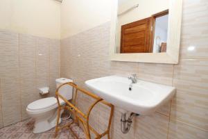 Koupelna v ubytování Dega Gardens + 37 fotografií