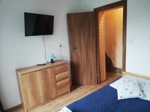 Posteľ alebo postele v izbe v ubytovaní "Dom Pod Grzybkiem"