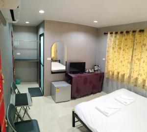 Postel nebo postele na pokoji v ubytování Guesthouse 88 Phang Nga