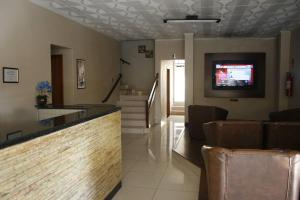 Et tv og/eller underholdning på Hotel Pousa La