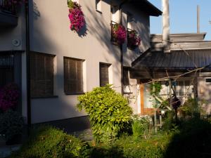a building with flower boxes on the side of it at Apartment Dubovac in Karlovac