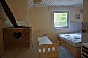 Postel nebo postele na pokoji v ubytování Chata Bačova skala
