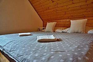 Postel nebo postele na pokoji v ubytování Chata Bačova skala